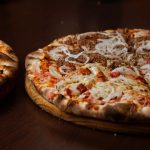 The History of Pizza in America: From Immigrant Staple to Icon